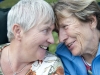 Senior Married Female Couple Laughing Together in Love